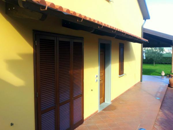 Pensilina in legno a sbalzo